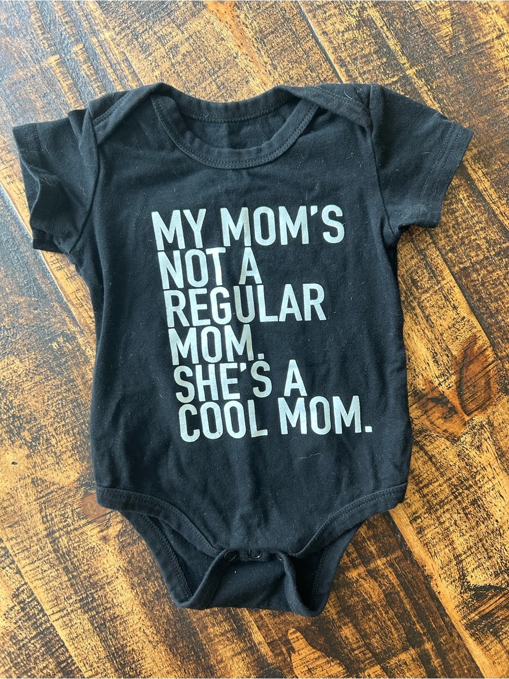 Black Baby One-Piece Bodysuit with 'Cool Mom' Slogan